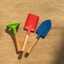 Load image into Gallery viewer, WYI Garden Tools 3-Piece Set, Metal Kiddie Trowel, Rake &amp; Shovel with Sturdy Wooden Handle Children Beach Sandbox Toy Safe Mini Gardening Tools for Outdoor Activities
